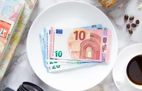 Europe currency with diary and coffee