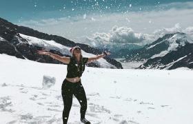 Girl on snowy mountain
